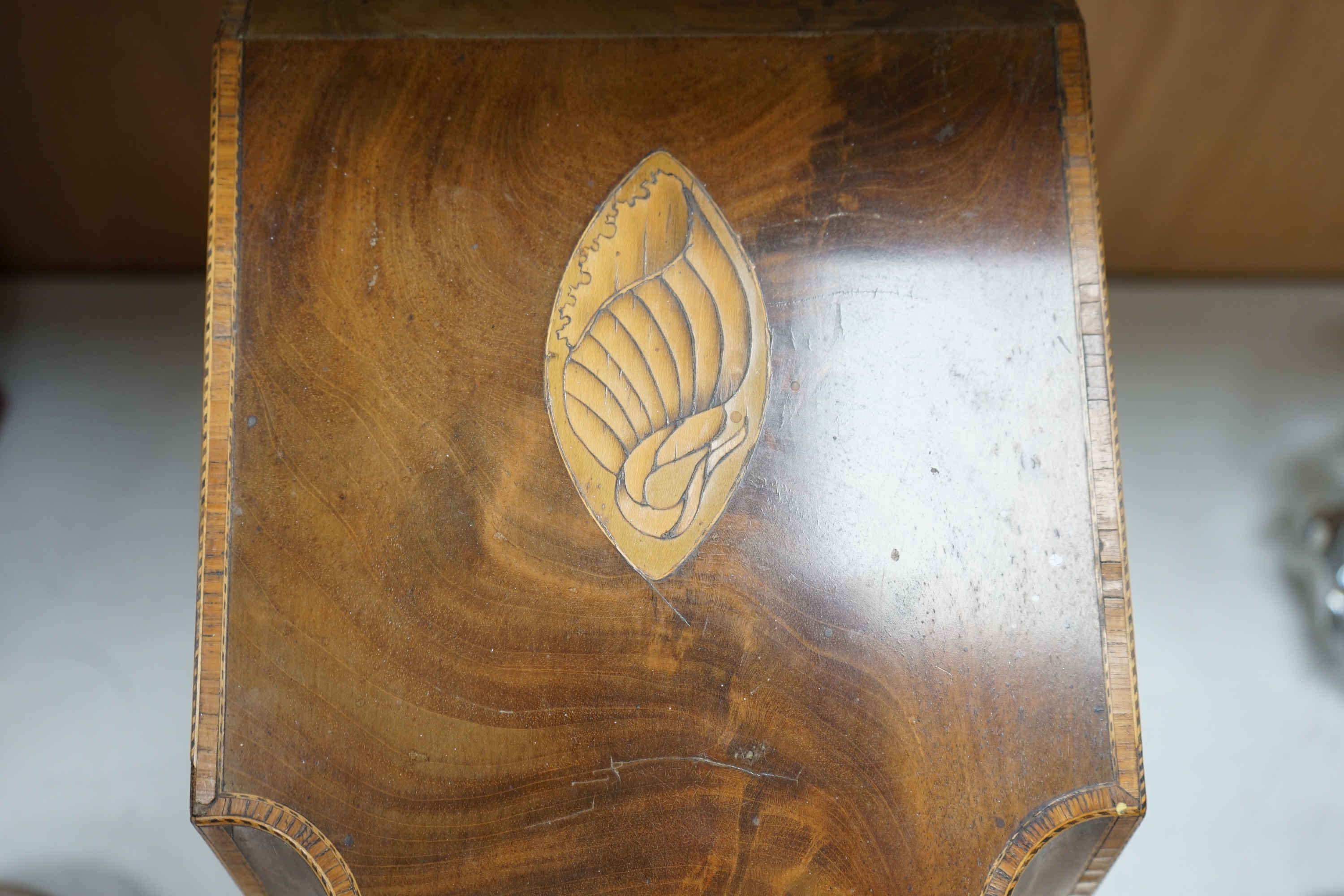 A George III mahogany shell inlaid knife box, converted to a stationery box, 36.5cm high at the back. Condition - needs cleaning and possibly repolishing